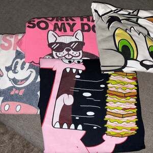 Lot of 4 T shirts Tom & Jerry Sponge Bob Felix Dog -you get what you see